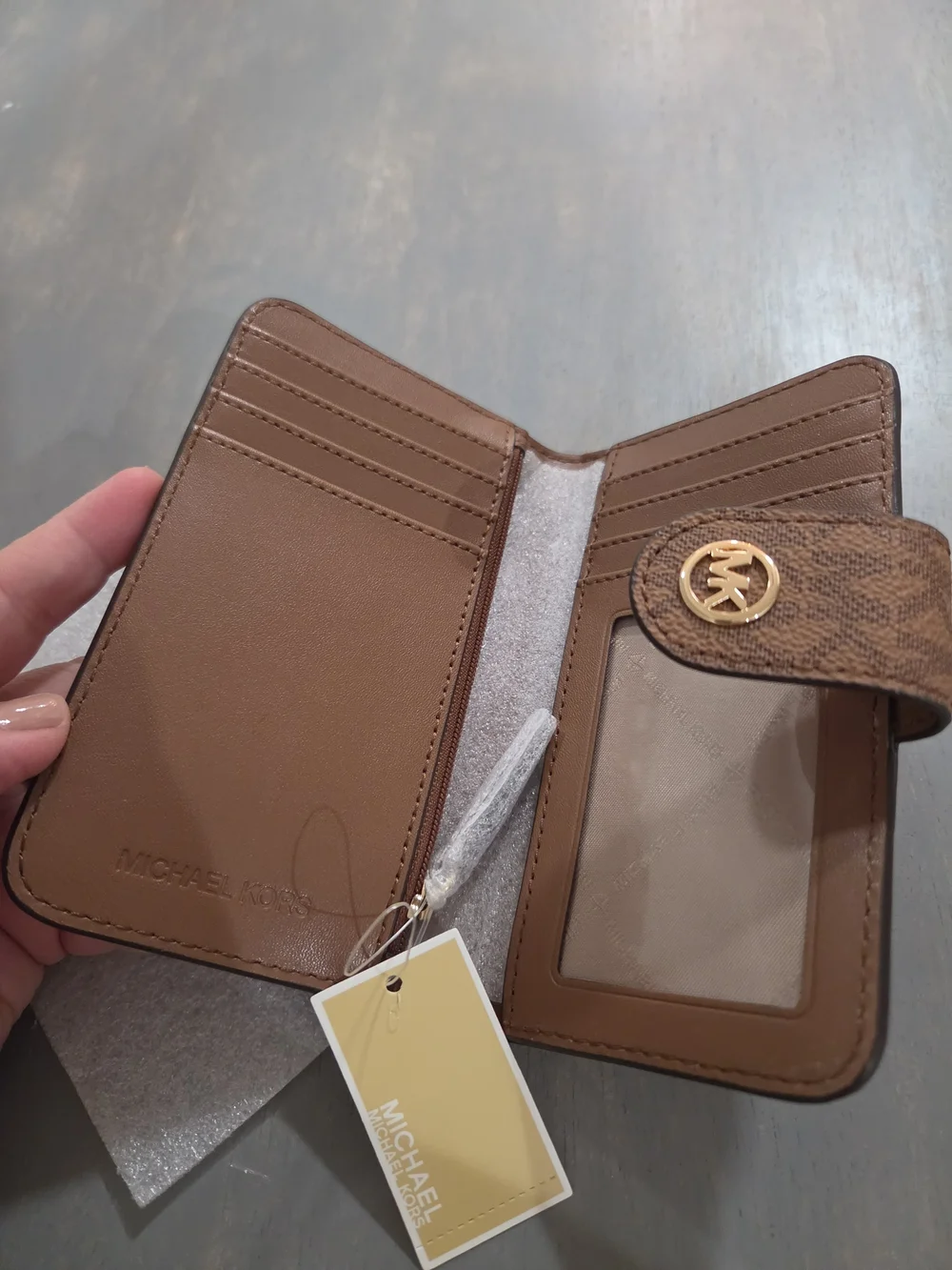 Michael Kors Brown Pebbled Leather Wallet-Style Phone Case with Gold MK Logo